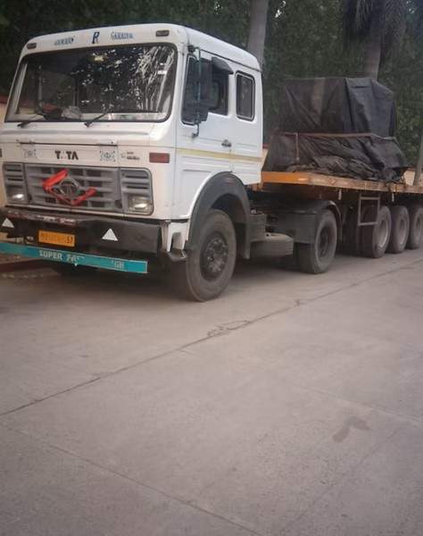 The Art of Drawing Readers In: Your attractive post title goes here Flatbed trailer truck carrying covered bulk industrial cargo for FTL service